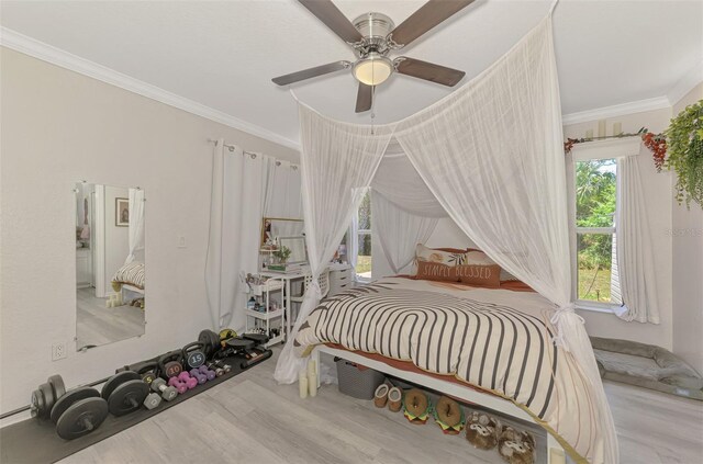 4129 Palisades Ave, North Port, FL 34287 - bedroom with crown molding, ceiling fan, and wood finished floors