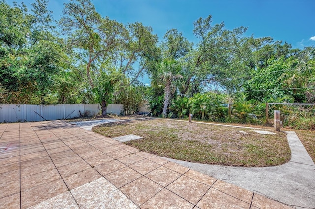 4129 Palisades Ave, North Port, FL 34287 - view of yard with a fenced backyard and a patio area