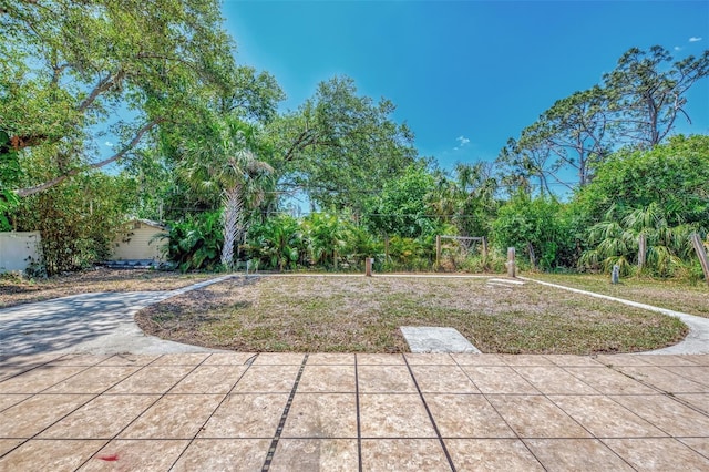 4129 Palisades Ave, North Port, FL 34287 - view of yard with a patio