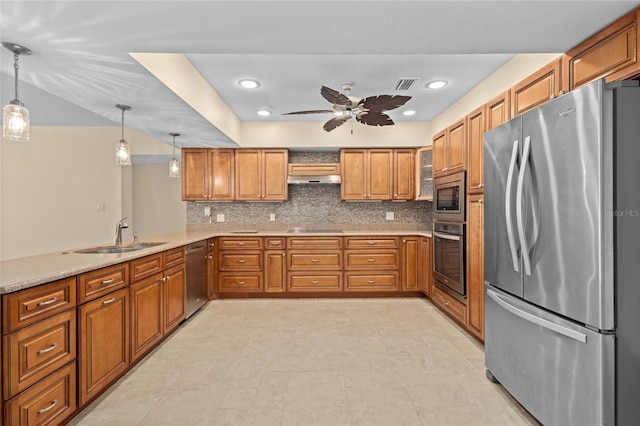 3230 Southshore Dr Unit 33A, Punta Gorda, FL 33955 - kitchen with appliances with stainless steel finishes, a sink, brown cabinets, backsplash, and decorative light fixtures