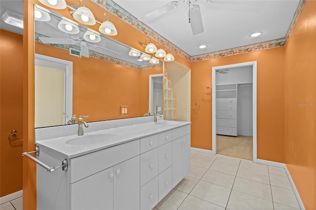 3230 Southshore Dr Unit 33A, Punta Gorda, FL 33955 - full bathroom with tile patterned flooring, a ceiling fan, baseboards, double vanity, and recessed lighting