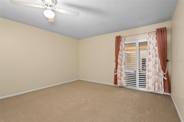 3230 Southshore Dr Unit 33A, Punta Gorda, FL 33955 - carpeted empty room with a textured ceiling, baseboards, and ceiling fan