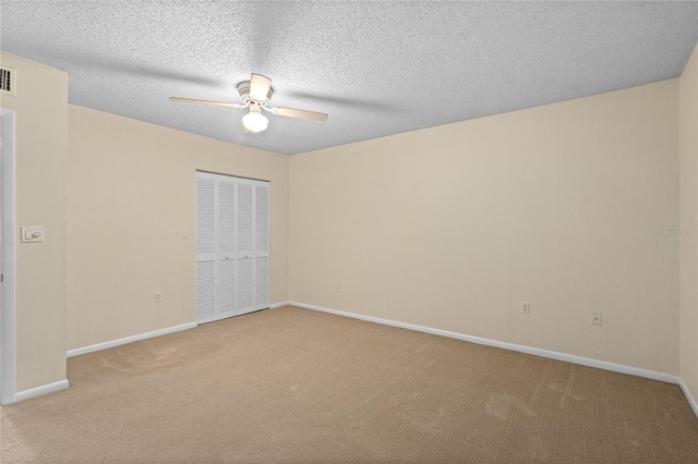 3230 Southshore Dr Unit 33A, Punta Gorda, FL 33955 - empty room with carpet, a ceiling fan, and baseboards