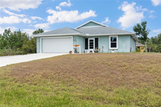 view of front facade featuring a garage, stucco siding, concrete driveway, and a front lawn