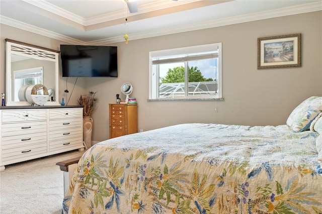 carpeted bedroom featuring crown molding and multiple windows