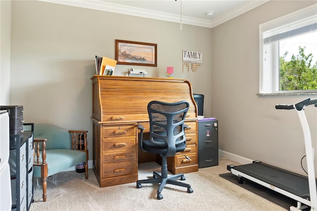 carpeted home office featuring baseboards and ornamental molding
