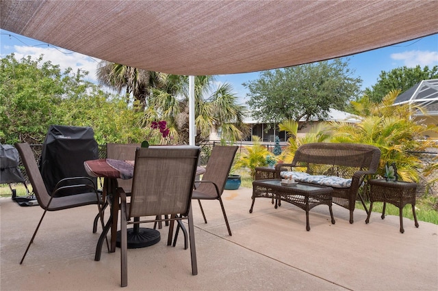 view of patio / terrace with outdoor dining space and grilling area