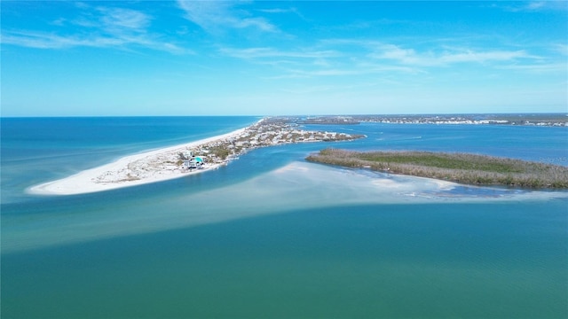 aerial view with a view of the beach and a water view