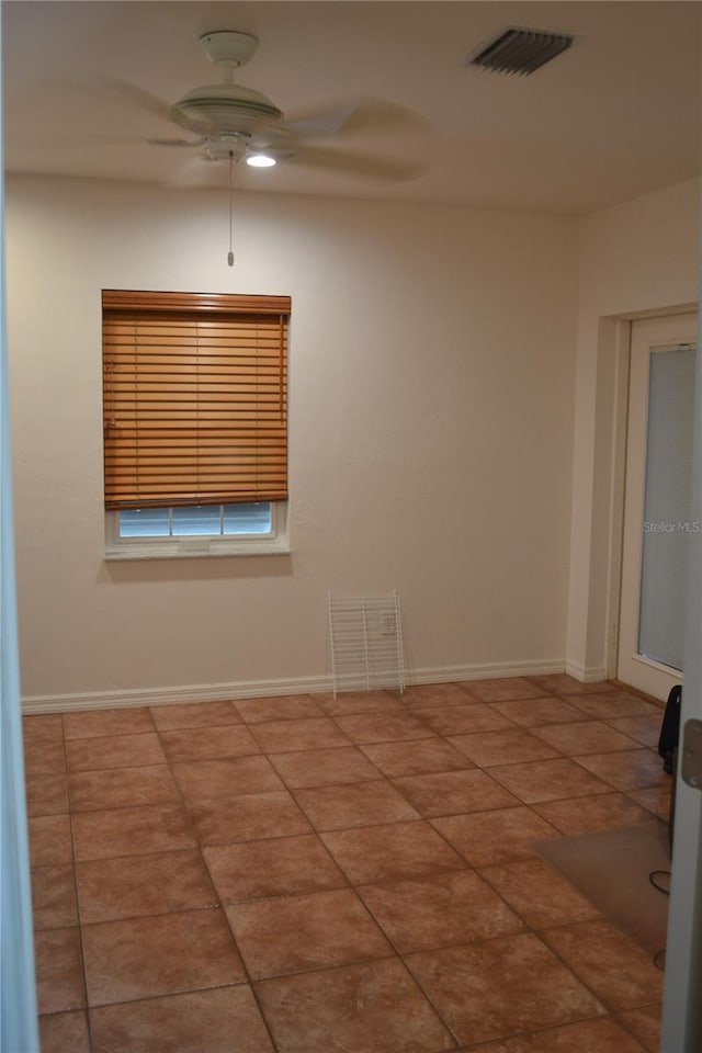 1118 NW 17th St, Cape Coral, FL 33993 - tiled spare room with baseboards, ceiling fan, and visible vents
