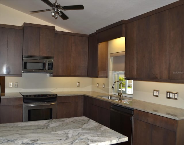1118 NW 17th St, Cape Coral, FL 33993 - kitchen with a ceiling fan, modern cabinets, a sink, lofted ceiling, and stainless steel appliances