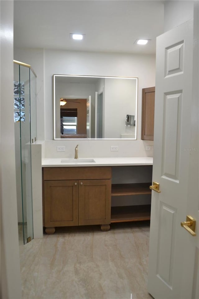 1118 NW 17th St, Cape Coral, FL 33993 - bathroom featuring recessed lighting, a shower stall, and vanity