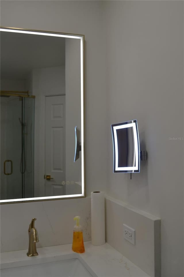 1118 NW 17th St, Cape Coral, FL 33993 - bathroom with vanity and a stall shower
