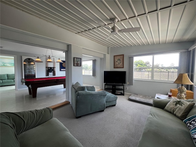 living area with plenty of natural light, baseboards, ceiling fan, and pool table