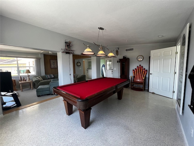 game room featuring billiards, a textured ceiling, speckled floor, and visible vents