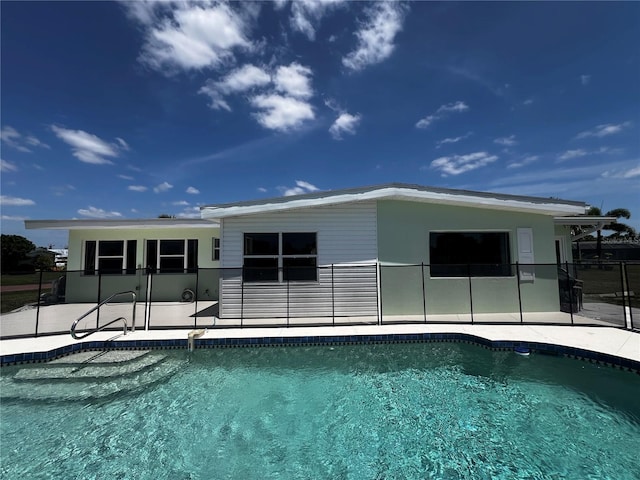 pool featuring a patio area