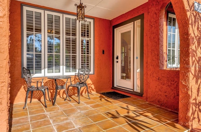 2002 Central Ave, Sarasota, FL 34234 - view of exterior entry with stucco siding and covered porch