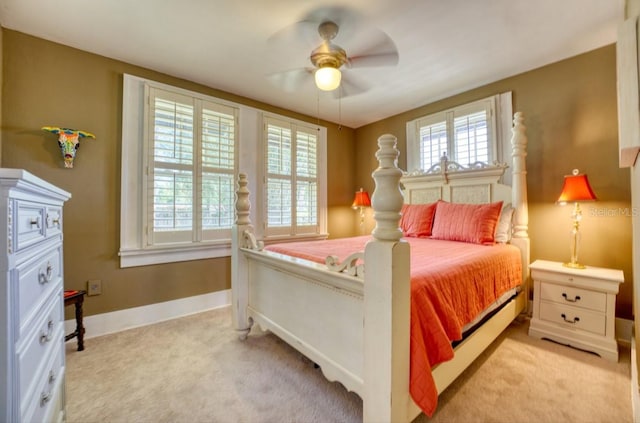 2002 Central Ave, Sarasota, FL 34234 - bedroom with light colored carpet and ceiling fan