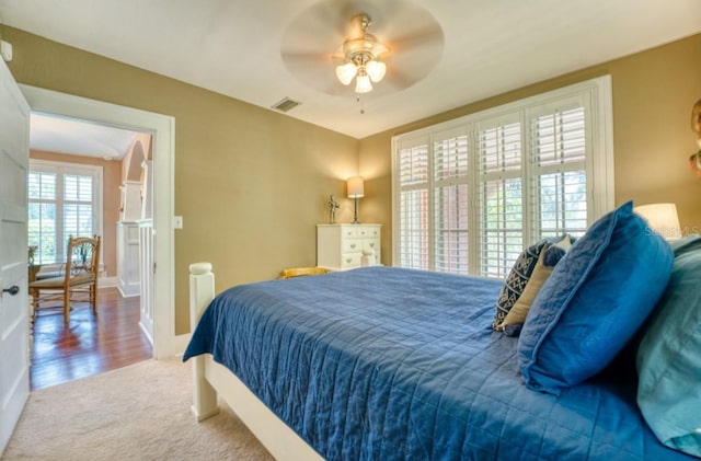 2002 Central Ave, Sarasota, FL 34234 - carpeted bedroom with ceiling fan and baseboards