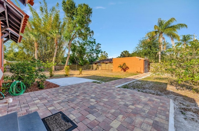 2002 Central Ave, Sarasota, FL 34234 - fenced backyard featuring a patio area