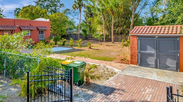 2002 Central Ave, Sarasota, FL 34234 - fenced backyard with a storage shed