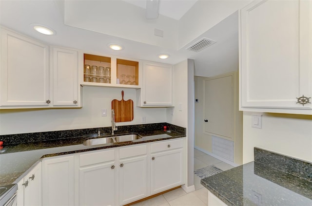 kitchen featuring a sink, open shelves, light tile patterned flooring, white cabinets, and recessed lighting