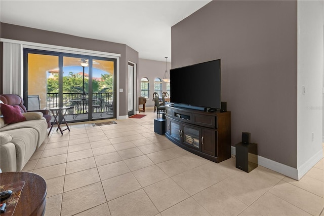 95 Vivante Blvd # 9524, Punta Gorda, FL 33950 - living room with light tile patterned flooring and baseboards