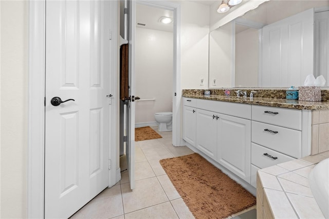 95 Vivante Blvd # 9524, Punta Gorda, FL 33950 - bathroom featuring vanity, tile patterned flooring, and toilet