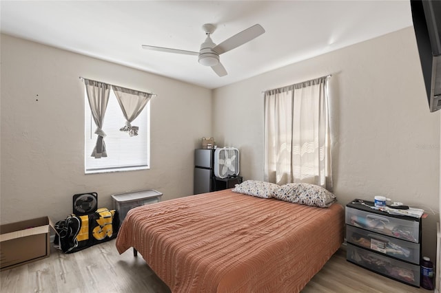 6309 Pontiac Ln, North Port, FL 34287 - bedroom with ceiling fan and wood finished floors