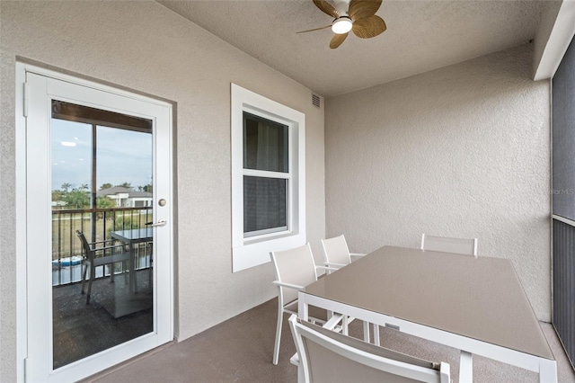balcony with ceiling fan and outdoor dining space