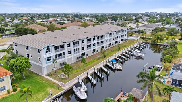 bird's eye view of a nearby body of water and numerous boat docks