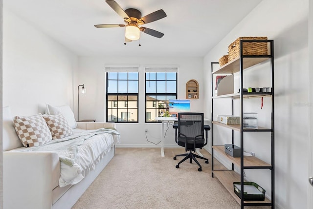 carpeted bedroom with baseboards