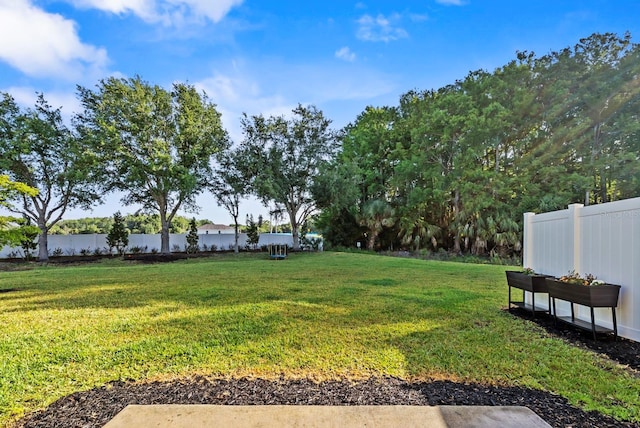 view of yard featuring fence