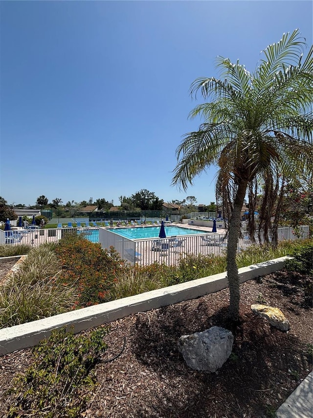 618 Bird Bay Dr S Unit 109, Venice, FL 34285 - community pool featuring fence