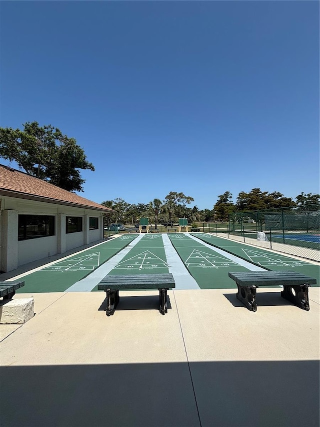 618 Bird Bay Dr S Unit 109, Venice, FL 34285 - surrounding community featuring shuffleboard and fence