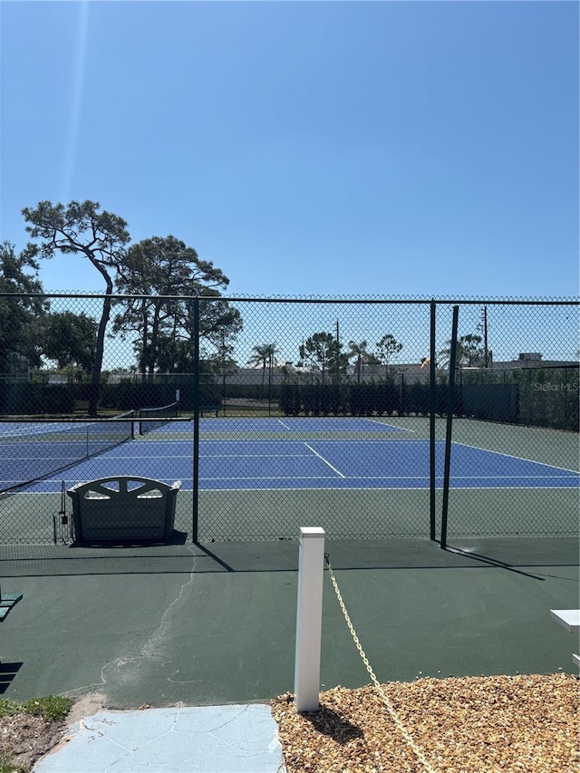 618 Bird Bay Dr S Unit 109, Venice, FL 34285 - view of tennis court featuring fence