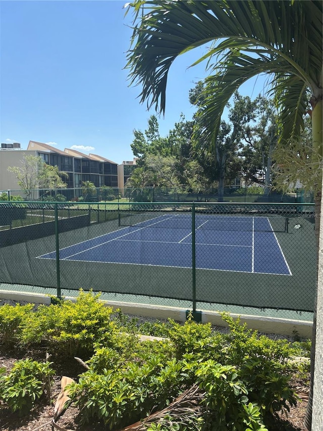 618 Bird Bay Dr S Unit 109, Venice, FL 34285 - view of tennis court with fence