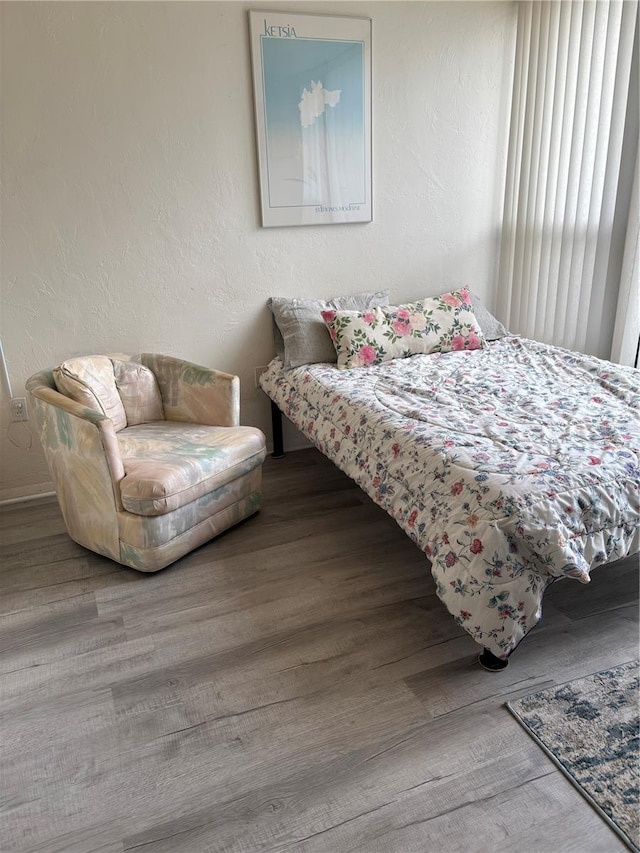 618 Bird Bay Dr S Unit 109, Venice, FL 34285 - bedroom featuring wood finished floors