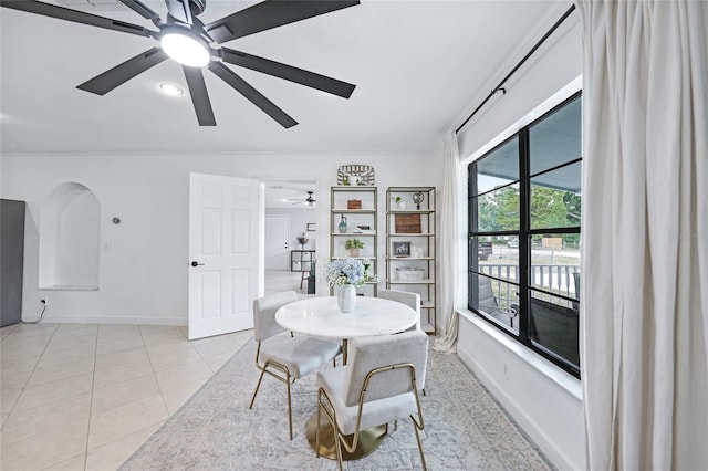 1741 NE Trisha Dr, Arcadia, FL 34266 - dining area with ceiling fan, baseboards, and light tile patterned floors