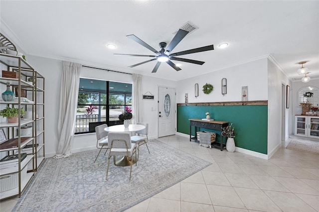 1741 NE Trisha Dr, Arcadia, FL 34266 - tiled dining space with ornamental molding, ceiling fan, and baseboards