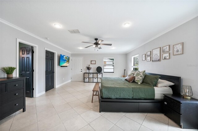 1741 NE Trisha Dr, Arcadia, FL 34266 - bedroom with ornamental molding, light tile patterned floors, a ceiling fan, and baseboards