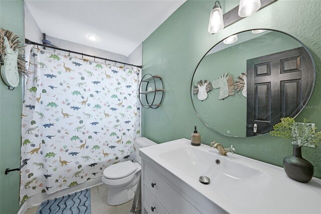 1741 NE Trisha Dr, Arcadia, FL 34266 - full bath featuring vanity, toilet, tile patterned flooring, and shower / bath combo with shower curtain