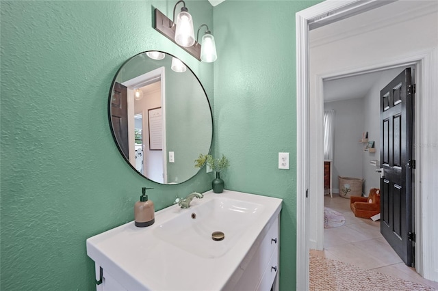1741 NE Trisha Dr, Arcadia, FL 34266 - bathroom featuring a textured wall, vanity, and tile patterned flooring