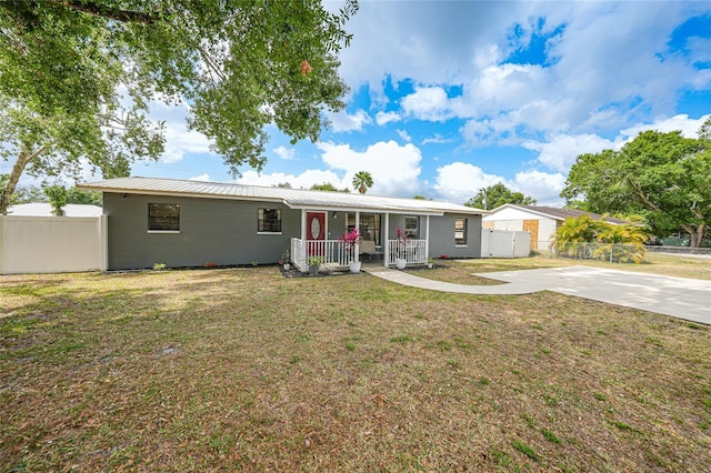 1741 NE Trisha Dr, Arcadia, FL 34266 - ranch-style home featuring covered porch and metal roof