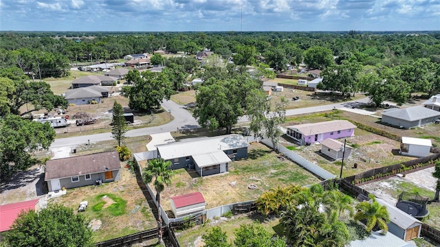 1741 NE Trisha Dr, Arcadia, FL 34266 - aerial view of residential area featuring a heavily wooded area
