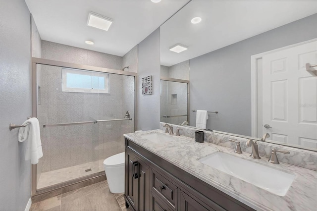 3520 Caya Largo Ct, Punta Gorda, FL 33950 - bathroom with a sink, a stall shower, toilet, and double vanity