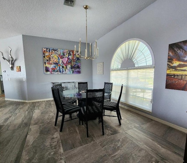 3520 Caya Largo Ct, Punta Gorda, FL 33950 - dining room with baseboards, visible vents, a textured ceiling, and a chandelier