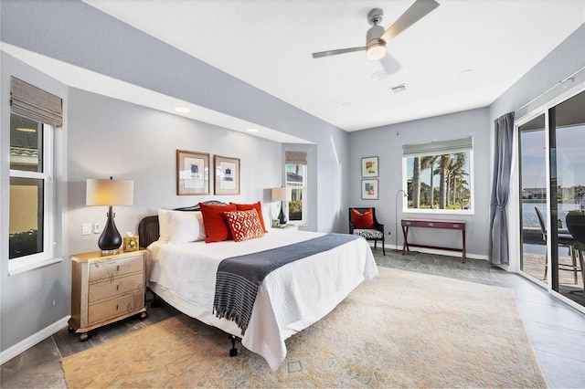 3520 Caya Largo Ct, Punta Gorda, FL 33950 - bedroom with baseboards, access to outside, multiple windows, and visible vents
