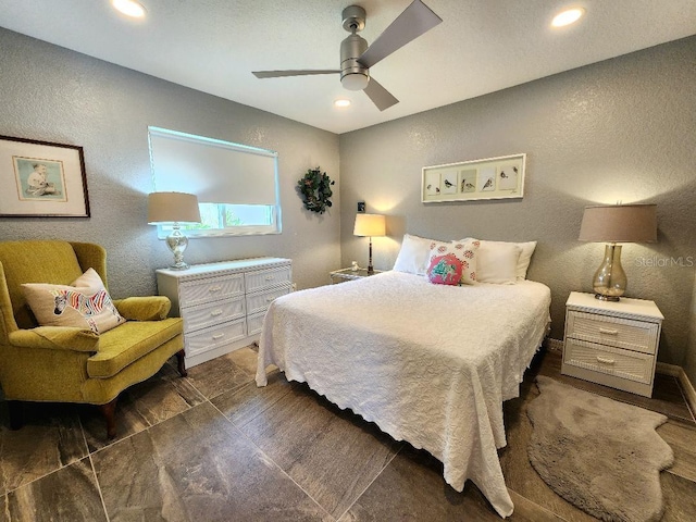 3520 Caya Largo Ct, Punta Gorda, FL 33950 - bedroom with a textured wall, recessed lighting, and ceiling fan