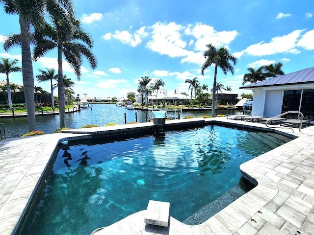 3520 Caya Largo Ct, Punta Gorda, FL 33950 - swimming pool featuring a water view, a dock, and a patio