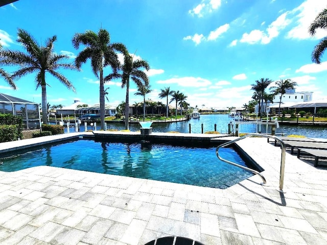 3520 Caya Largo Ct, Punta Gorda, FL 33950 - view of swimming pool featuring a water view and a dock